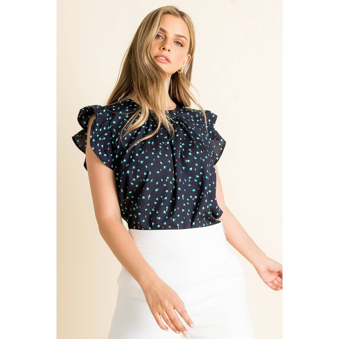 Top- Navy Flutter Sleeve with Scattered Green Dots