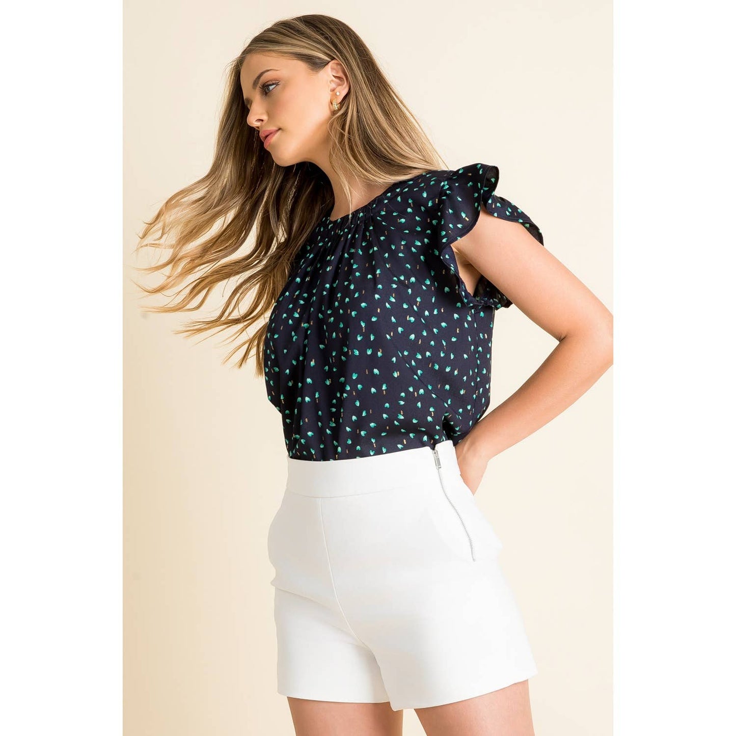 Top- Navy Flutter Sleeve with Scattered Green Dots