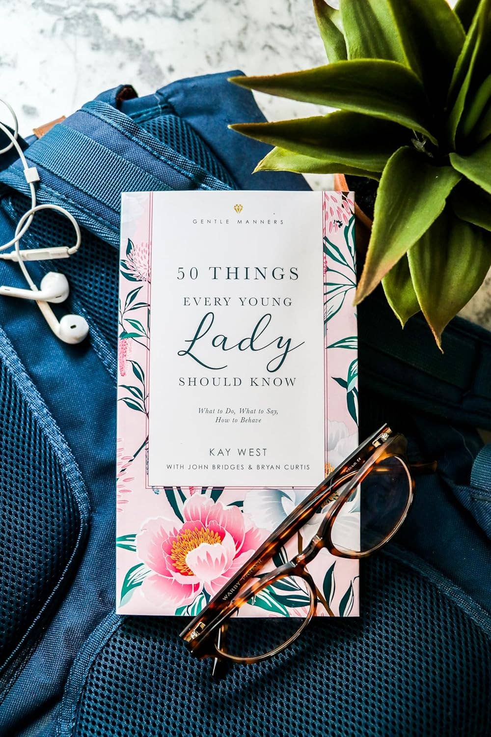 Book - 50 Things Every Young Lady Should Know